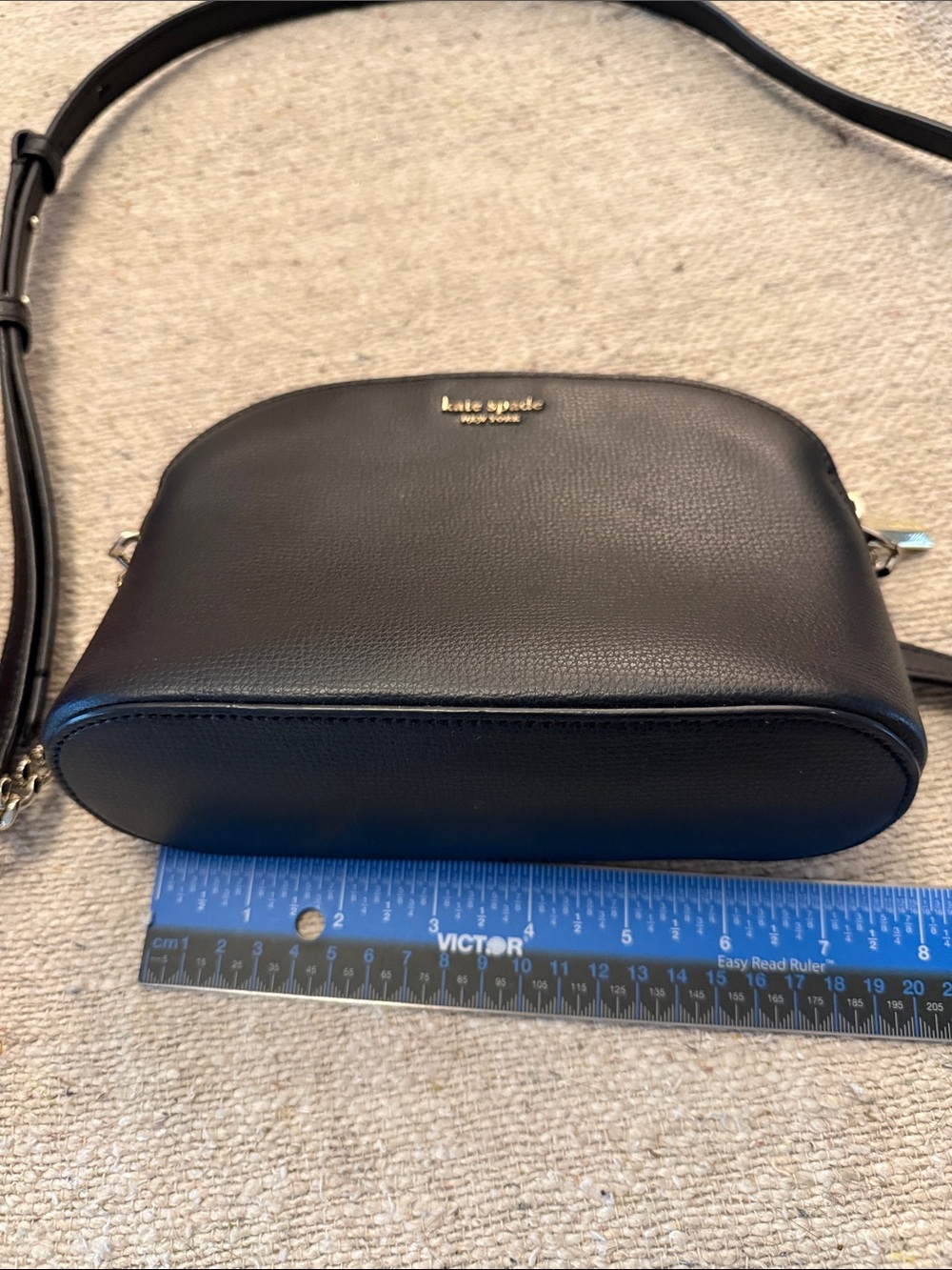 kate spade black pebbled leather dome crossbody with gold logo